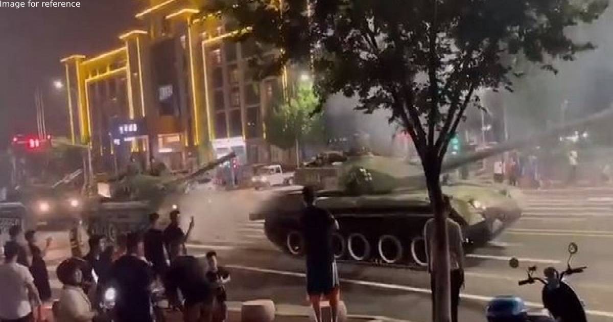 China deploys tanks to prevent people from withdrawing money from crisis-hit banks; grim reminder of Tiananmen Square incident